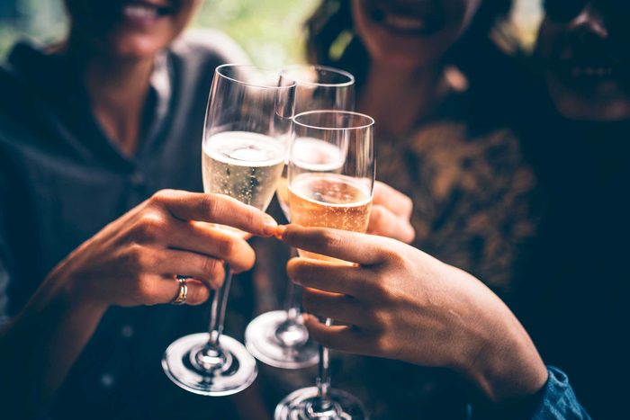 people toasting with champagne flutes