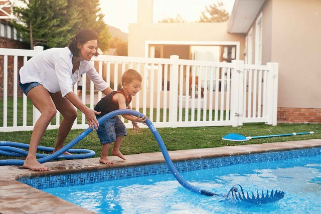 mother and son at pool