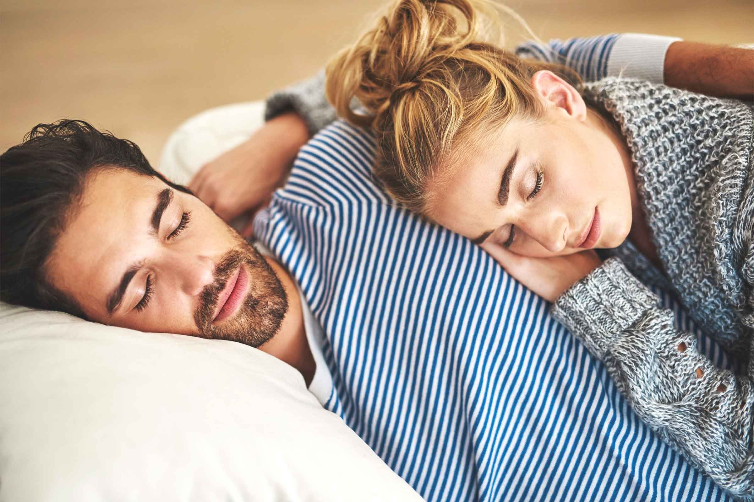 man woman sleeping