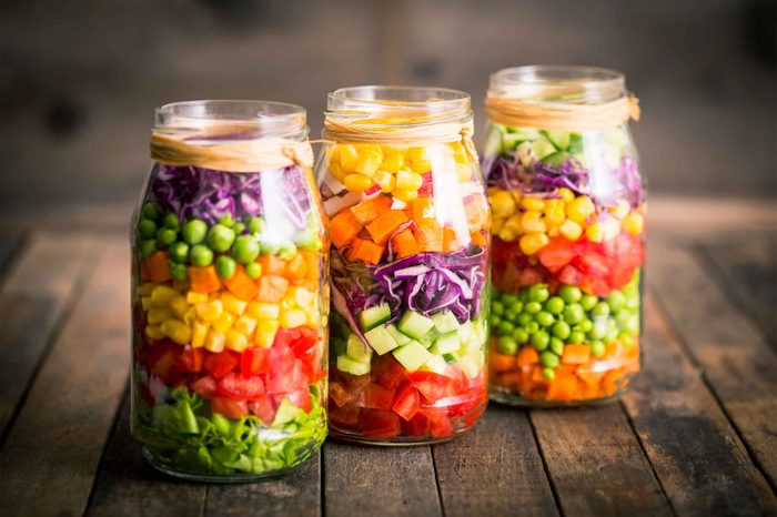 jars with layered chopped produce