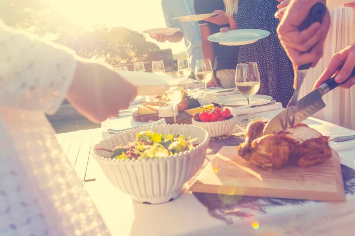 table set for dinner with wine glasses, outdoors