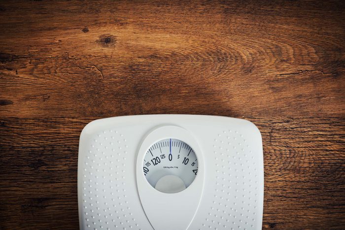 scale on a wood floor