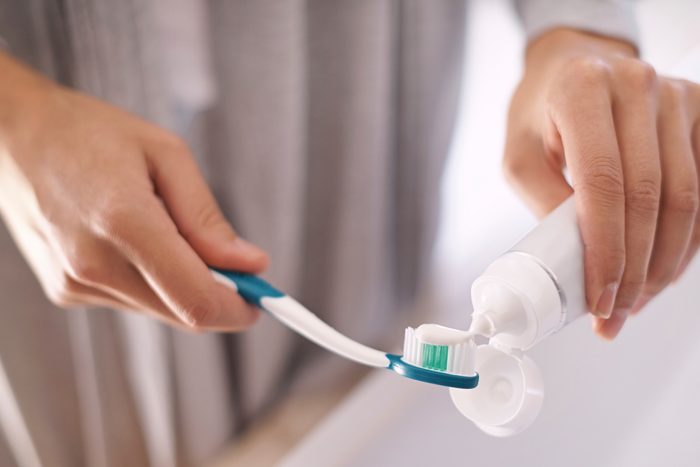 toothpaste on toothbrush