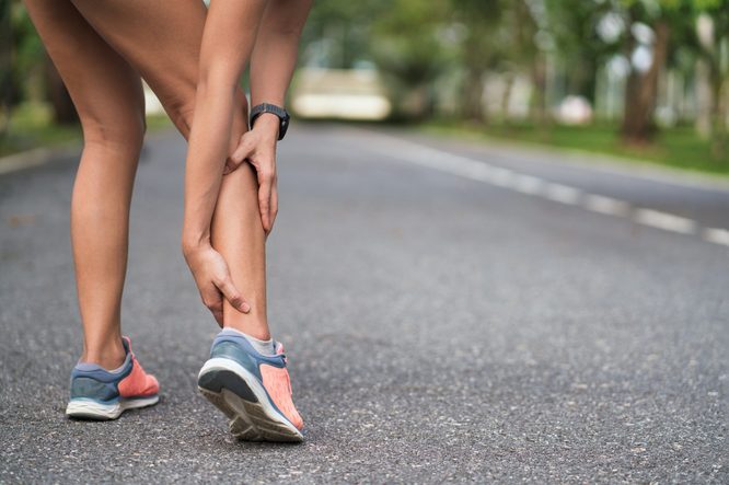 woman with sore leg muscles