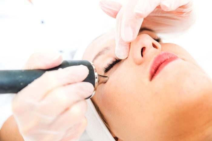woman getting BL-laser treatment