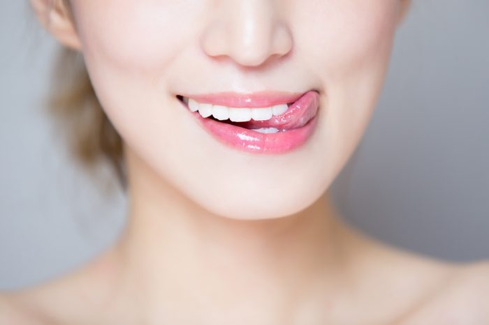 woman licking lips
