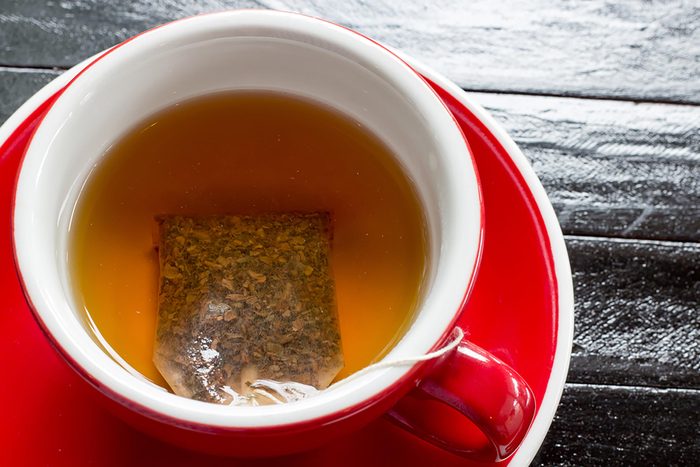 tea bag and tea in mug