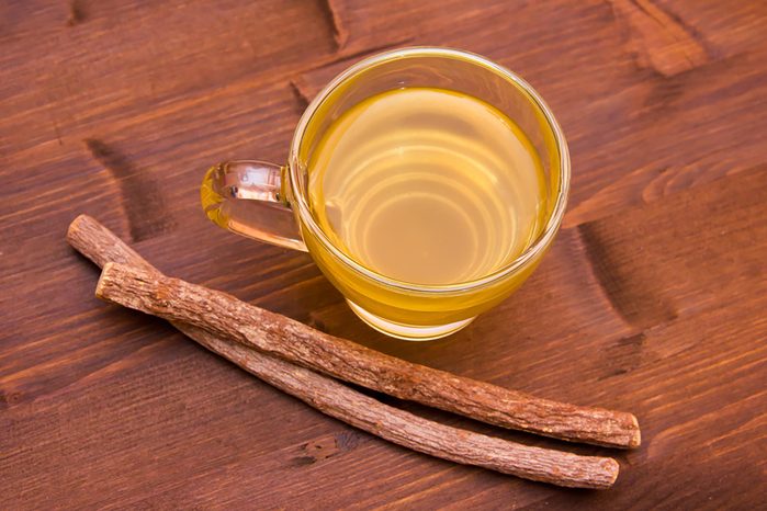 tea in mug and licorice sticks