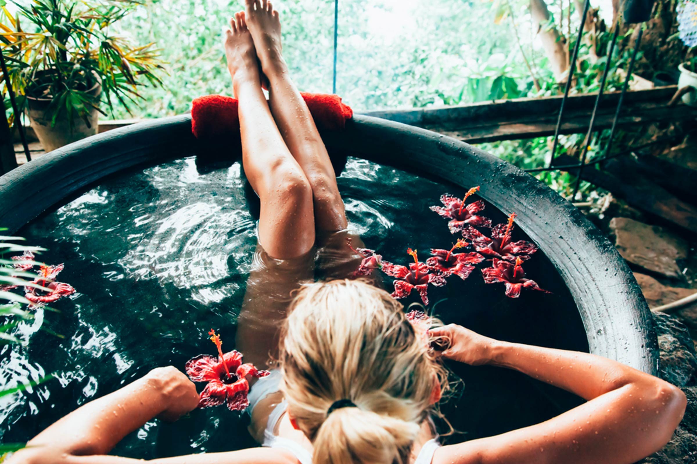 Woman soaking in tub