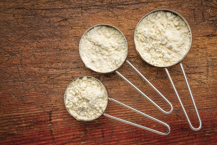 measuring cups full of powder
