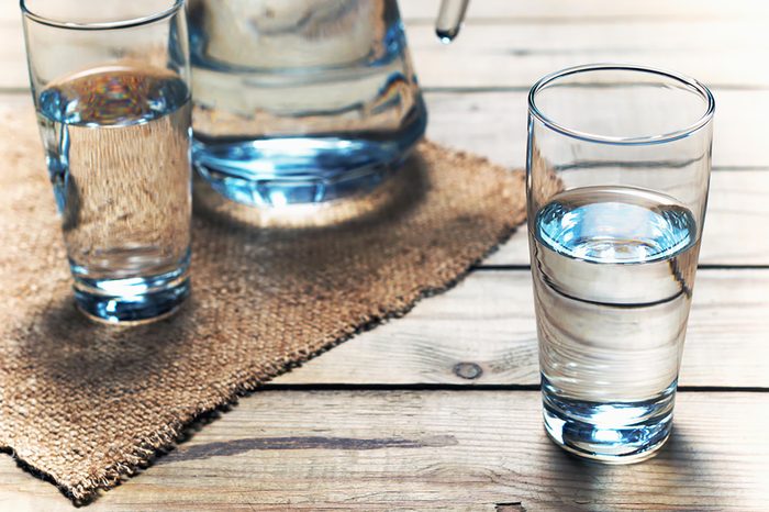 Two glasses of water with pitcher