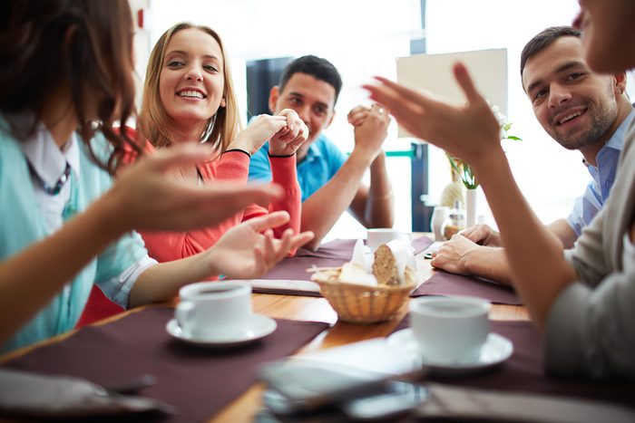 friends at dinner table