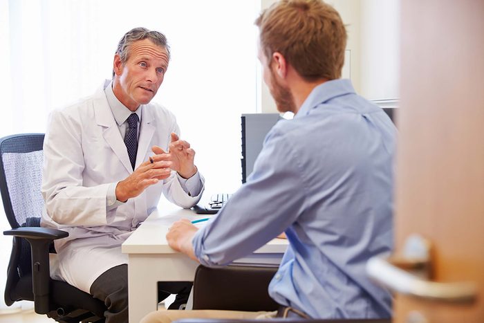 doctor with male patient