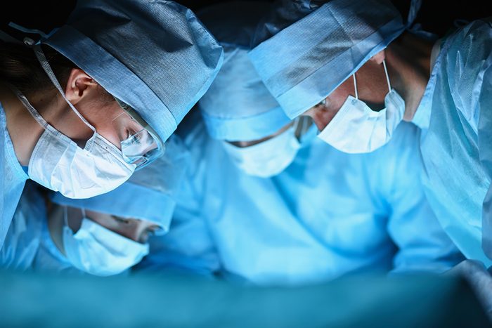 doctors in surgery with facemasks