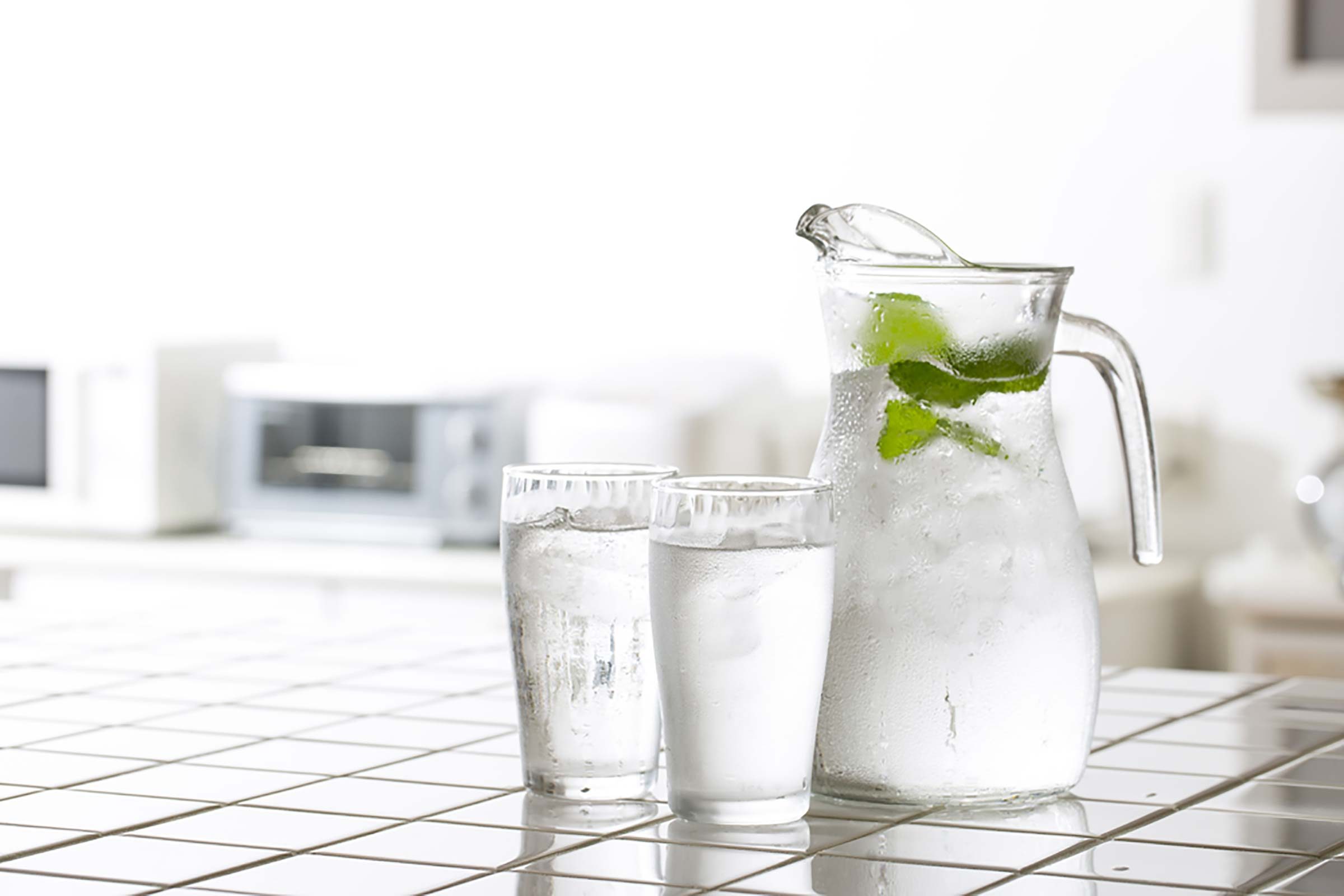 Pitcher and two glasses of water. 