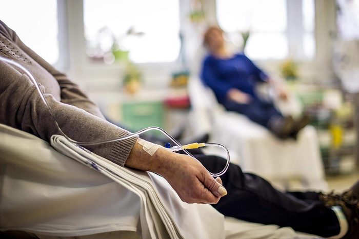 patient with IV in arm