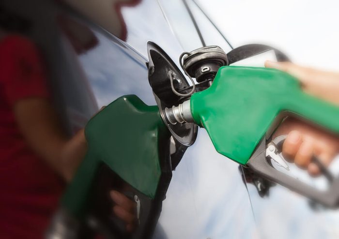 gas pump and car