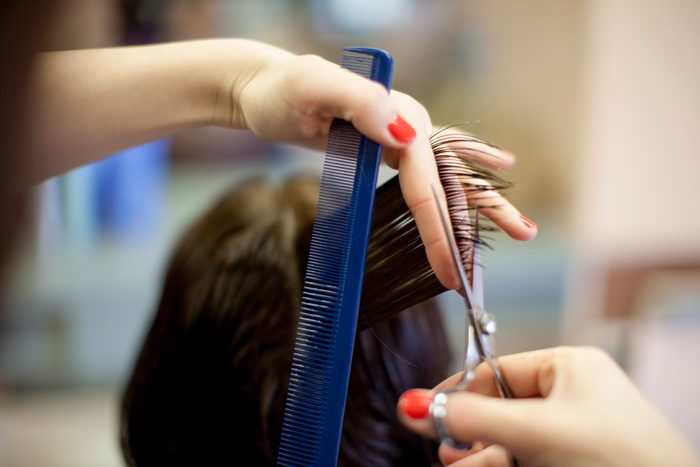 close up of cutting hair