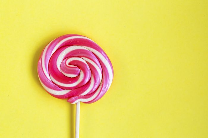 pink and white swirled lollipop