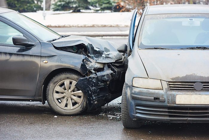 car crash accident on street, damaged automobiles after collision in city