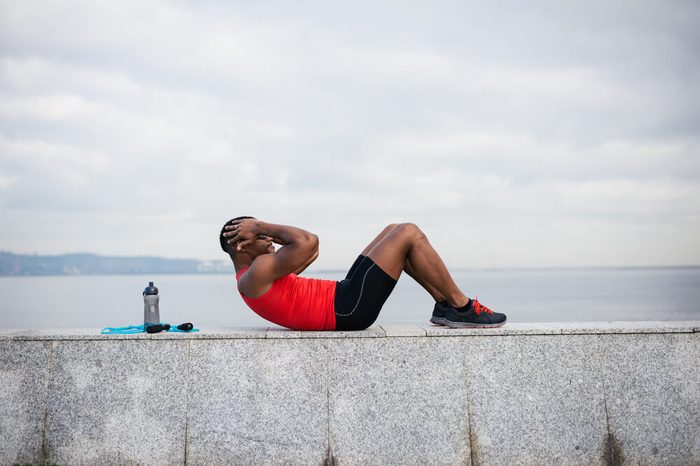 Man doing sit ups.