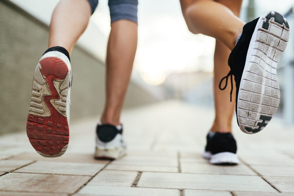 people jogging sneakers