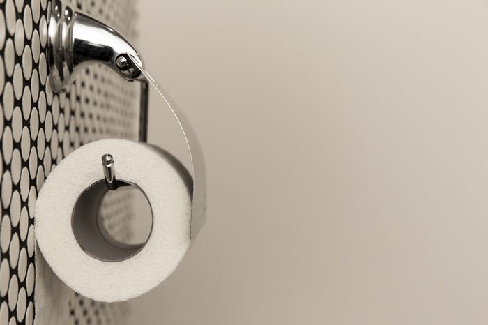 white toilet paper on a roll