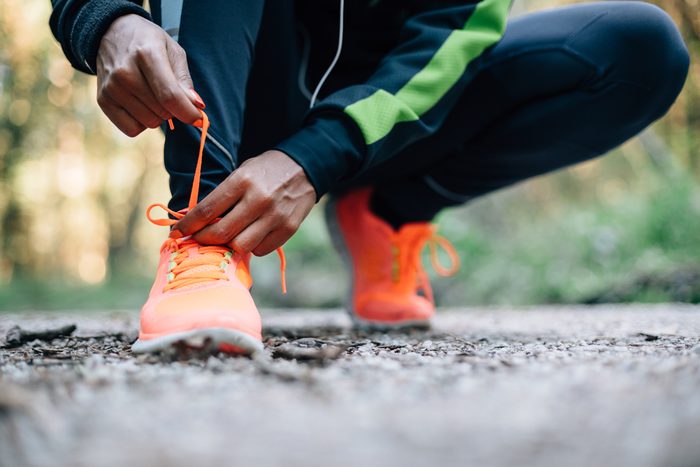 Person tying sneakers