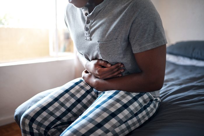 man experiencing abdominal pain
