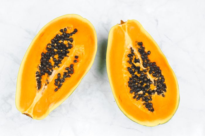 Fresh papaya cut in a half