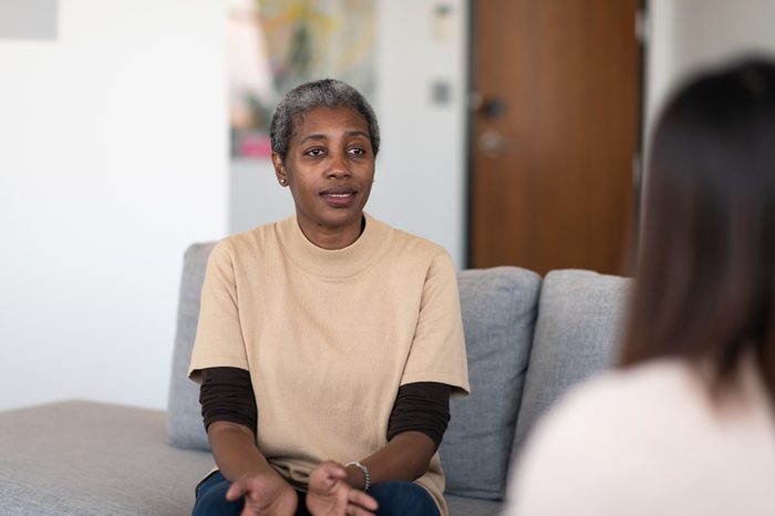 woman talking to therapist