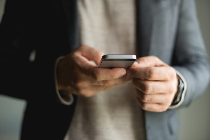 man using a smartphone