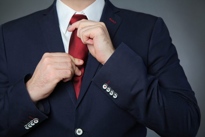 man wearing blue business suit