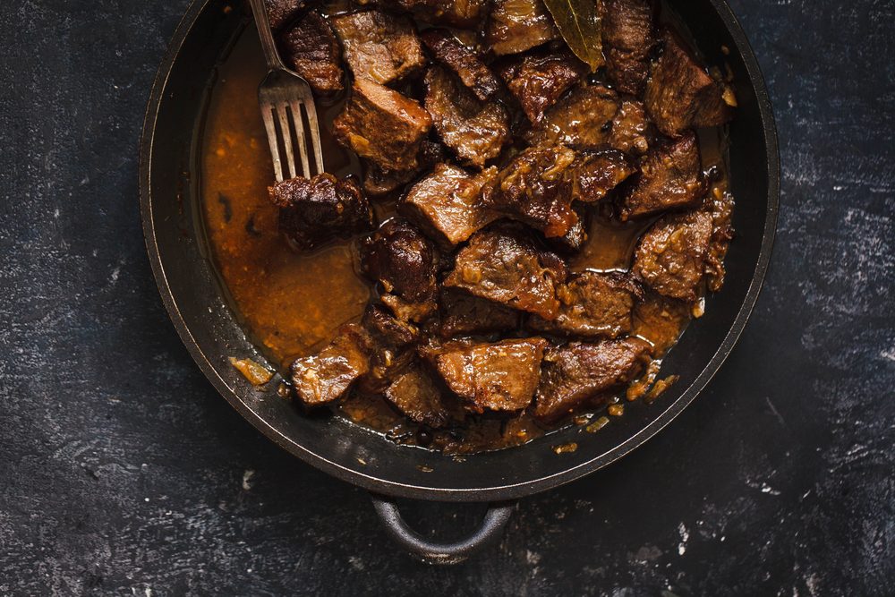 Beef meat stew. Overhead view braised beef meat stew with vegetables in pot.