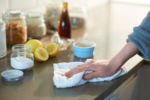 wiping down kitchen counter