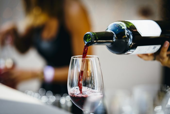 Pouring red wine