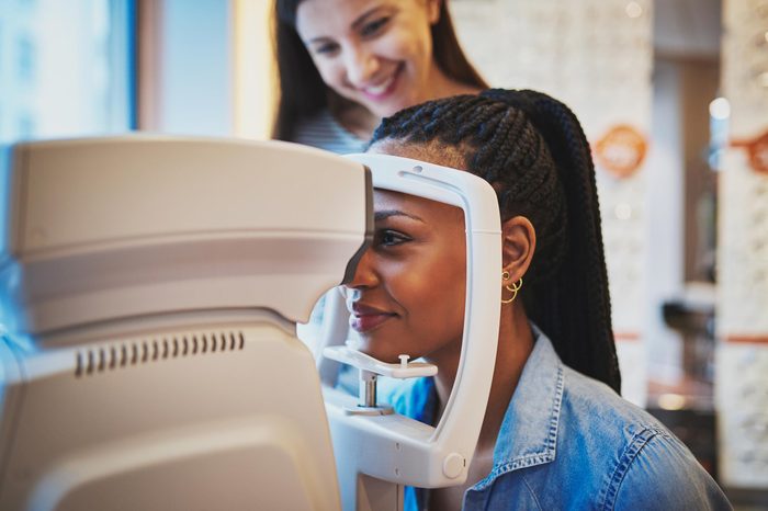 Woman getting an eye exam at the optometrist's office.