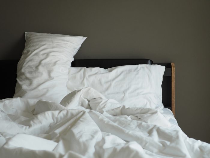 unmade, empty bed