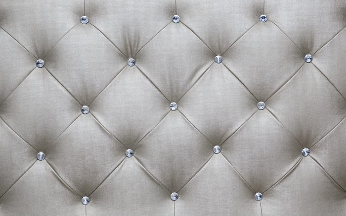 White couch cushions, background patterns.
