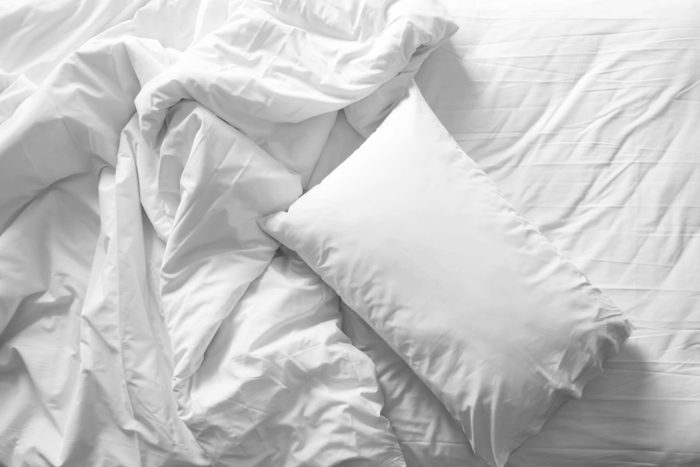 pillow bed sheets, unmade