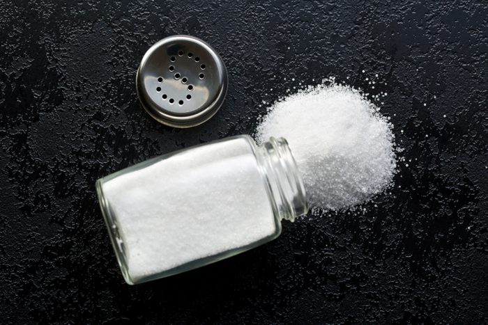 salt shaker on black kitchen table