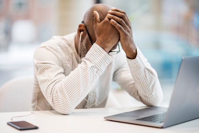 tired businessman at work