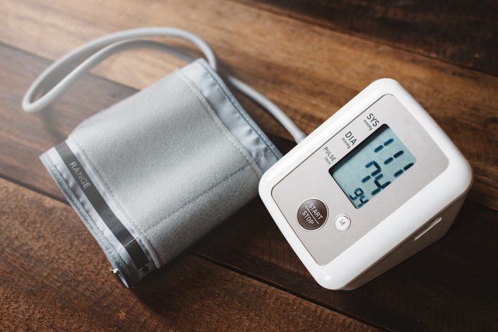 blood pressure machine on wood table