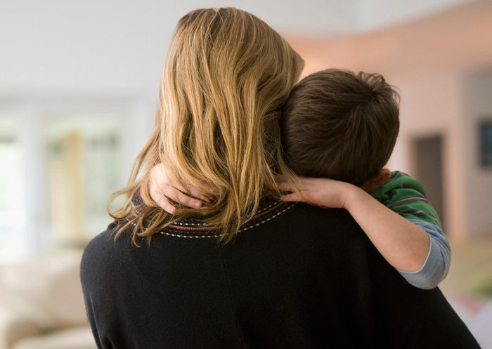 mother hugging son