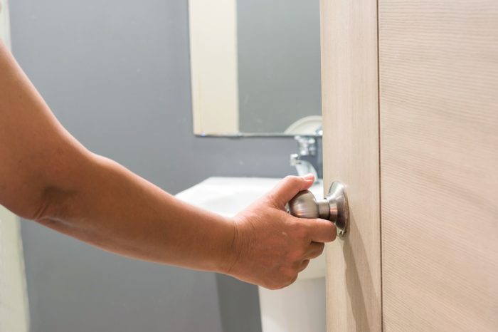 opening door to bathroom