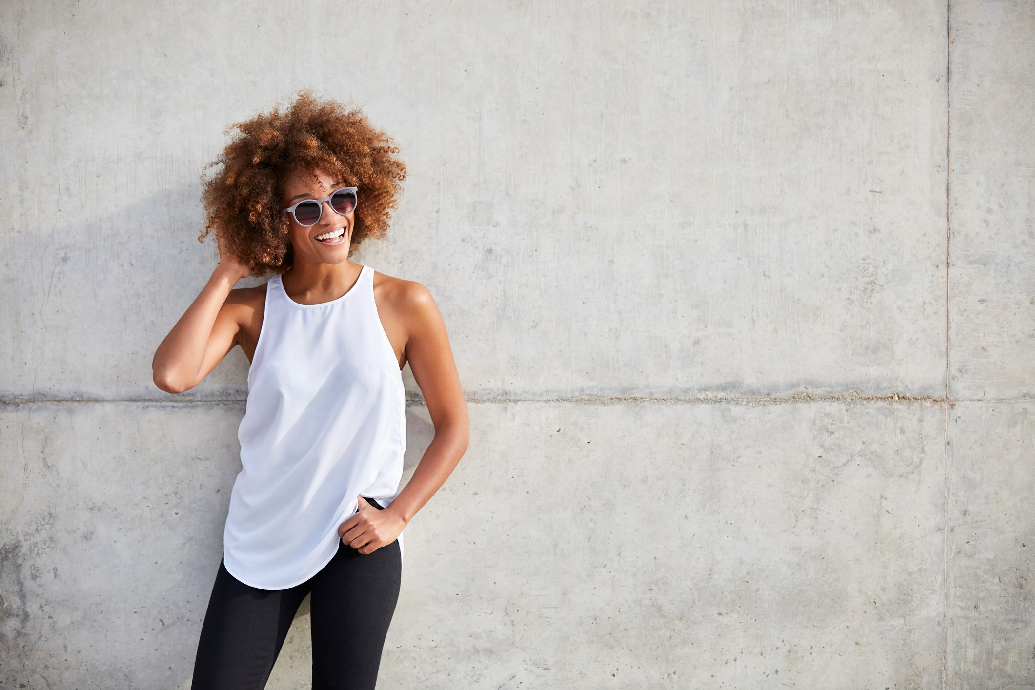 happy smiling woman in tank top