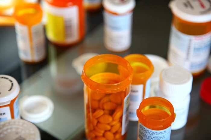 various pill bottles on counter