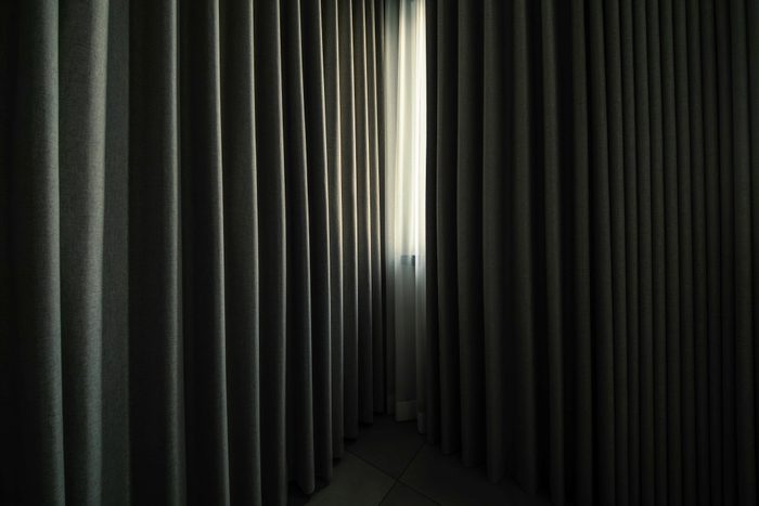 The light shining through the curtains