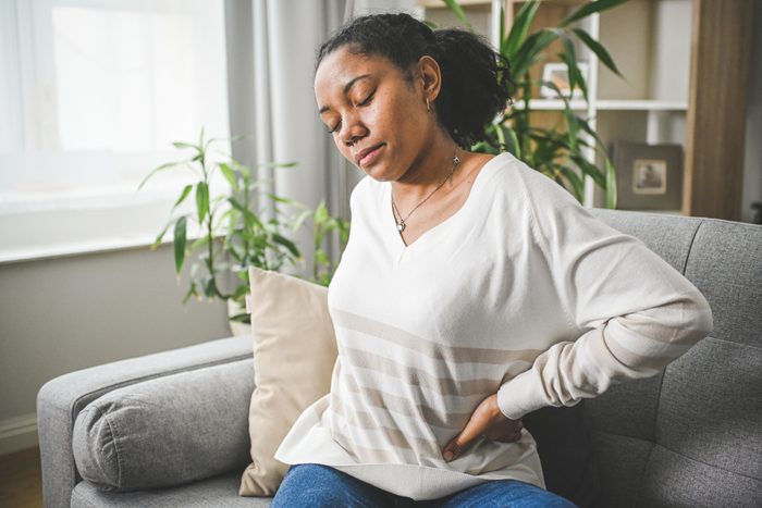 Woman is sick (stomachache)